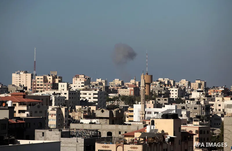 Smoke raises from eastern Gaza City following an Israeli military strike on October 5, 2016. Israeli tank fire struck a Hamas post in the Gaza Strip after a rocket launched from the Palestinian enclave hit a nearby Israe...