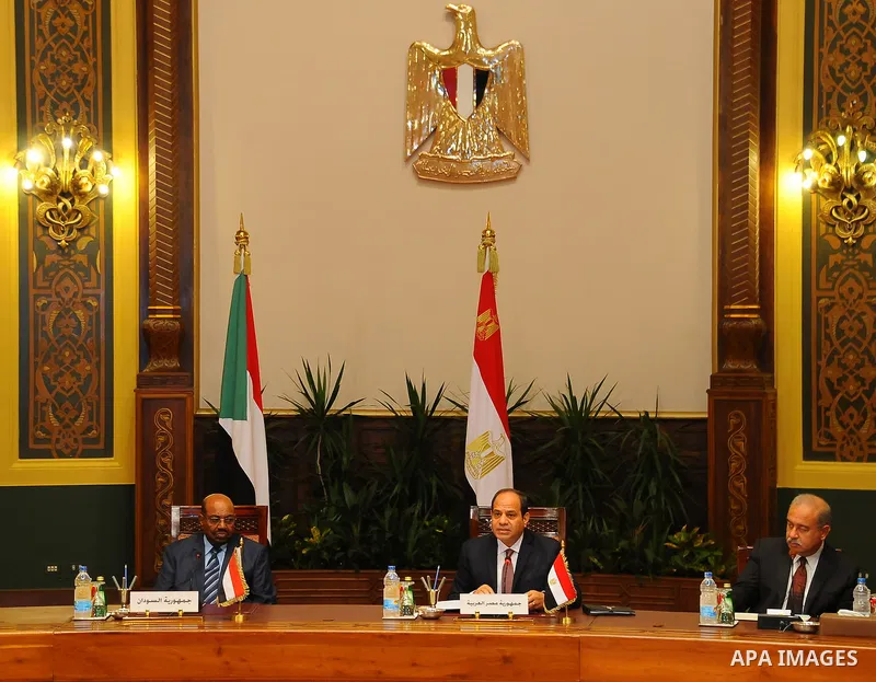 Egyptian President Abdel Fattah al-Sisi meets with Sudanese President Omar al-Bashir in Cairo, Egypt, on Oct. 05, 2016. Photo by Egyptian President Office