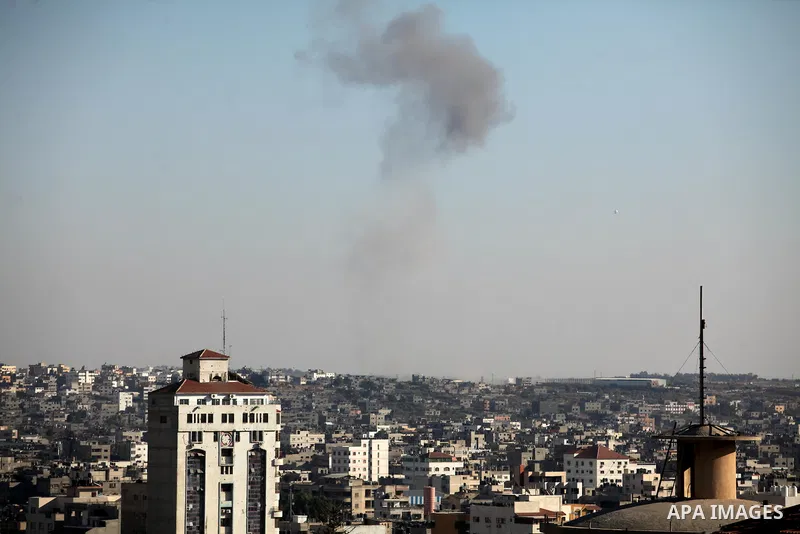 Smoke raises from eastern Gaza City following an Israeli military strike on October 5, 2016. Israeli tank fire struck a Hamas post in the Gaza Strip after a rocket launched from the Palestinian enclave hit a nearby Israe...
