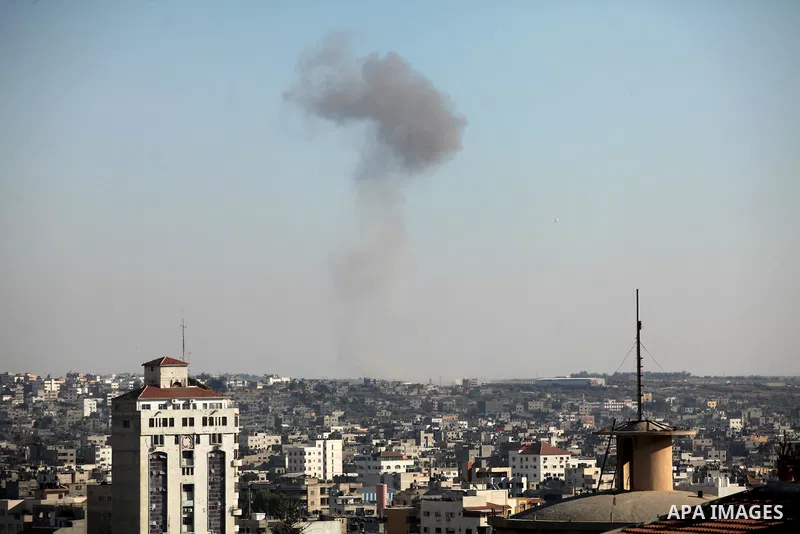 Smoke raises from eastern Gaza City following an Israeli military strike on October 5, 2016. Israeli tank fire struck a Hamas post in the Gaza Strip after a rocket launched from the Palestinian enclave hit a nearby Israe...