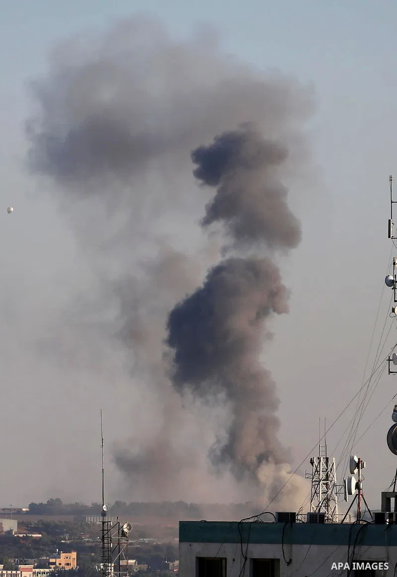 Smoke rises from east Gaza City after Israeli military struck Hamas position in the Gaza Strip on October 5, 2016. Israel's military struck several Hamas positions in the Gaza Strip after a rocket launched from the Pales...