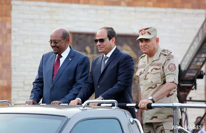 President of Egypt Abdel Fattah el-Sisi and President of Sudan Omar al-Bashir take part in the celebrations staged within 43rd anniversary of the 1973 victory over Israel in Cairo, Egypt on October 5, 2016 Photo by Egypt...
