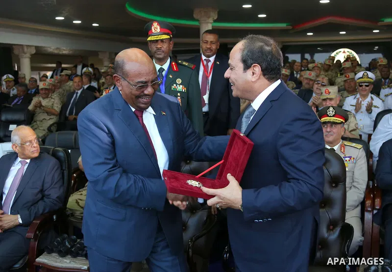 President of Egypt Abdel Fattah el-Sisi and President of Sudan Omar al-Bashir take part in the celebrations staged within 43rd anniversary of the 1973 victory over Israel in Cairo, Egypt on October 5, 2016 Photo by Egypt...
