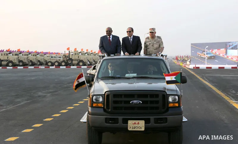 President of Egypt Abdel Fattah el-Sisi and President of Sudan Omar al-Bashir take part in the celebrations staged within 43rd anniversary of the 1973 victory over Israel in Cairo, Egypt on October 5, 2016 Photo by Egypt...