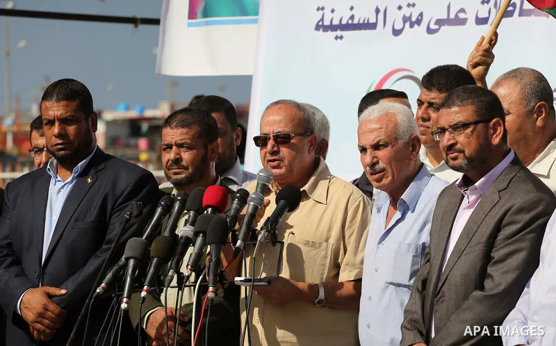 Deputy Speaker of the Legislative Council, Faisal Abu Shahla speaks during a press conference in the port of Gaza city, on October 6, 2016. Photo by Mohammed Asad