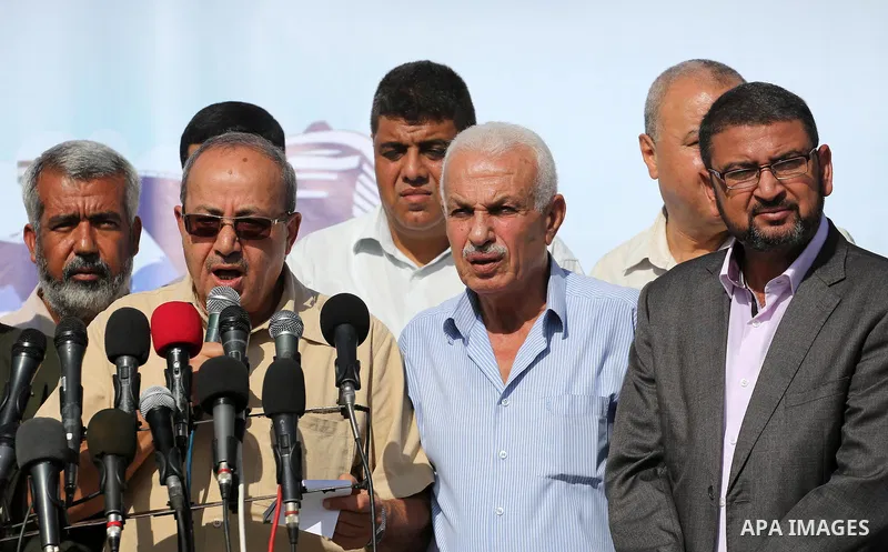 Deputy Speaker of the Legislative Council, Faisal Abu Shahla speaks during a press conference in the port of Gaza city, on October 6, 2016. Photo by Mohammed Asad