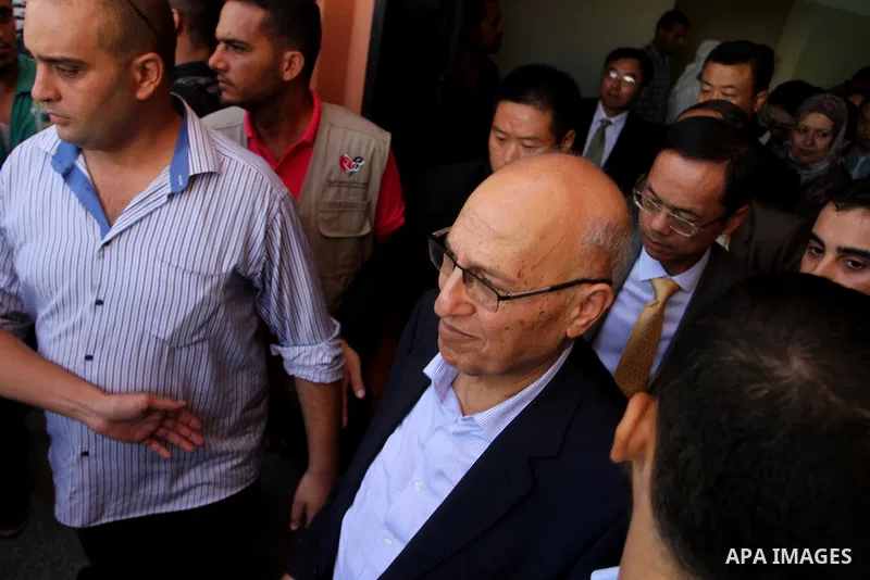 Chinese Ambassador to Palestine, Chen Zhong Xing and former Palestinian chief negotiator and member of the Central Committee of Fatah, Nabil Shaath open the project of Lighting solar homes, in Khan Younis in the southern...