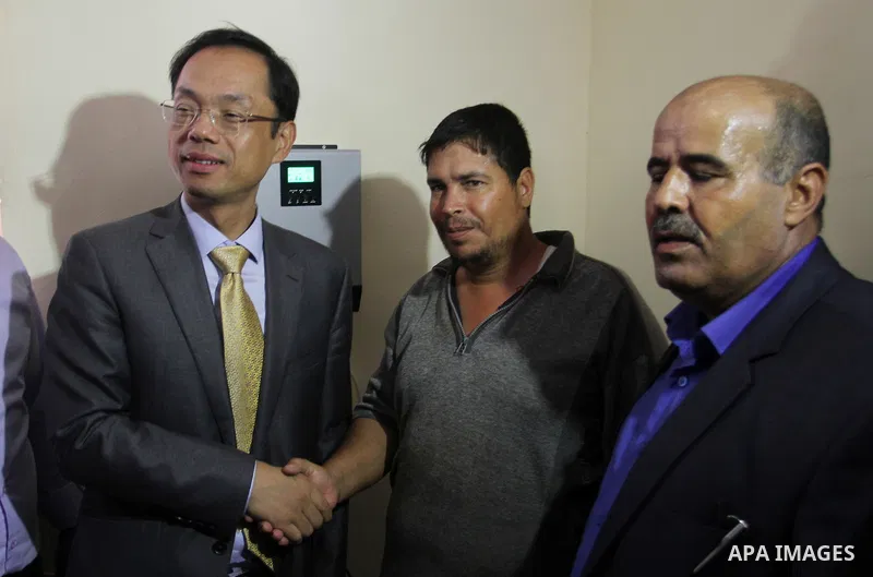 Chinese Ambassador to Palestine, Chen Zhong Xing and former Palestinian chief negotiator and member of the Central Committee of Fatah, Nabil Shaath open the project of Lighting solar homes, in Khan Younis in the southern...