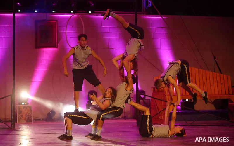International and local artists, perform during the Palestine Circus Festival, in the West Bank city of Ramallah, on October 6, 2016. Photo by Shadi Hatem