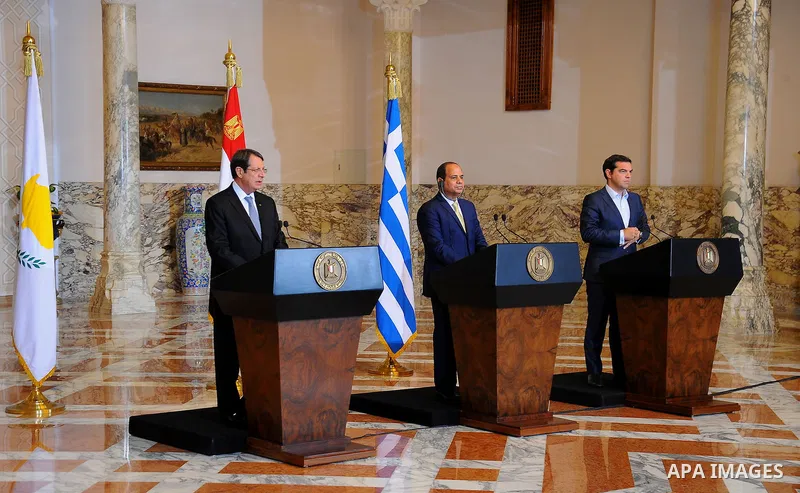 Egypt's President Abdel Fattah al-Sisi attends with Greek Prime Minister Alexis Tsipras and Cyprus' President Nicos Anastasiades a news conference and the summit about ways to combat illegal immigration to Europe at the...