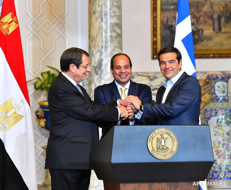 Egypt's President Abdel Fattah al-Sisi attends with Greek Prime Minister Alexis Tsipras and Cyprus' President Nicos Anastasiades a news conference and the summit about ways to combat illegal immigration to Europe at the...