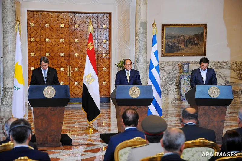 Egypt's President Abdel Fattah al-Sisi attends with Greek Prime Minister Alexis Tsipras and Cyprus' President Nicos Anastasiades a news conference and the summit about ways to combat illegal immigration to Europe at the...