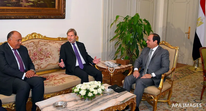 Egyptian President Abdel Fattah al-Sisi meets with European Union's Enlargement Commissioner Johannes Hahn, in Cairo, Egypt, on Oct. 12, 2016. Photo by Egyptian President Office