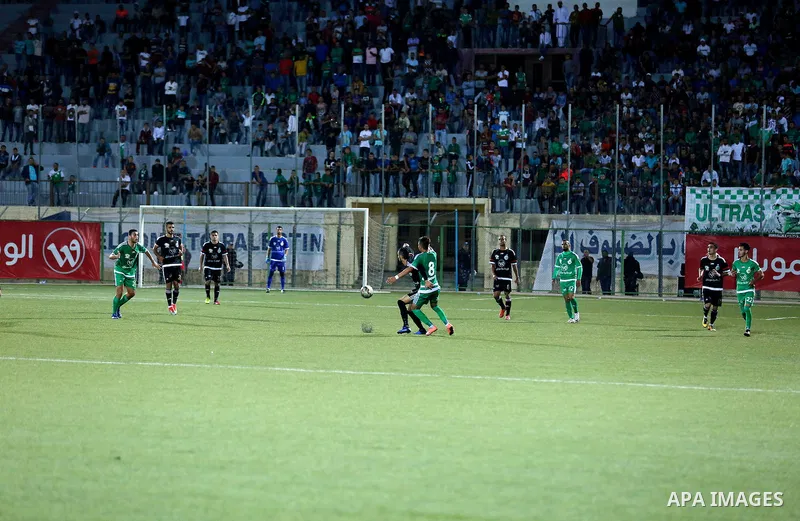 Shabab Hebron players and Ozlan south (Zahryah) players compete during the final match of the Palestinian Cup (Abu Ammar Cup), in the West Bank city of Hebron, on October 15, 2016. Photo by Wisam Hashlamoun