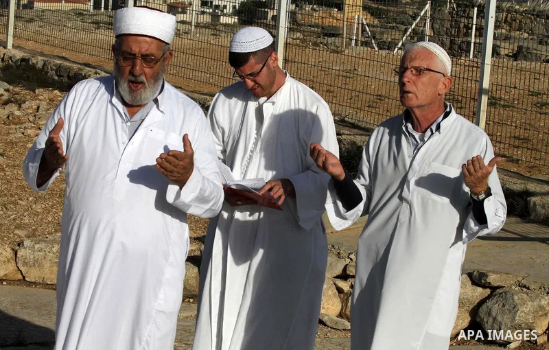 Samaritans pray on top of Mount Gerizim near the northern West Bank city of Nablus on October 17, 2016 during Sukkot (Tabernacles) celebrations. Sukkot marks the exodus of the ancient Hebrew people from Egypt. The Samari...