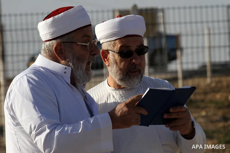 Samaritans pray on top of Mount Gerizim near the northern West Bank city of Nablus on October 17, 2016 during Sukkot (Tabernacles) celebrations. Sukkot marks the exodus of the ancient Hebrew people from Egypt. The Samari...