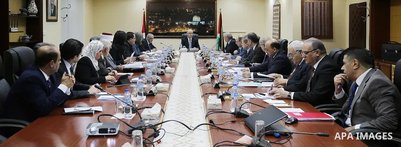 Palestinian Prime Minister, Rami Hamdallah, chairs a meeting of Council of Ministers, in the West Bank city, of Ramallah, Oct. 18, 2016. Photo by Prime Minister Office