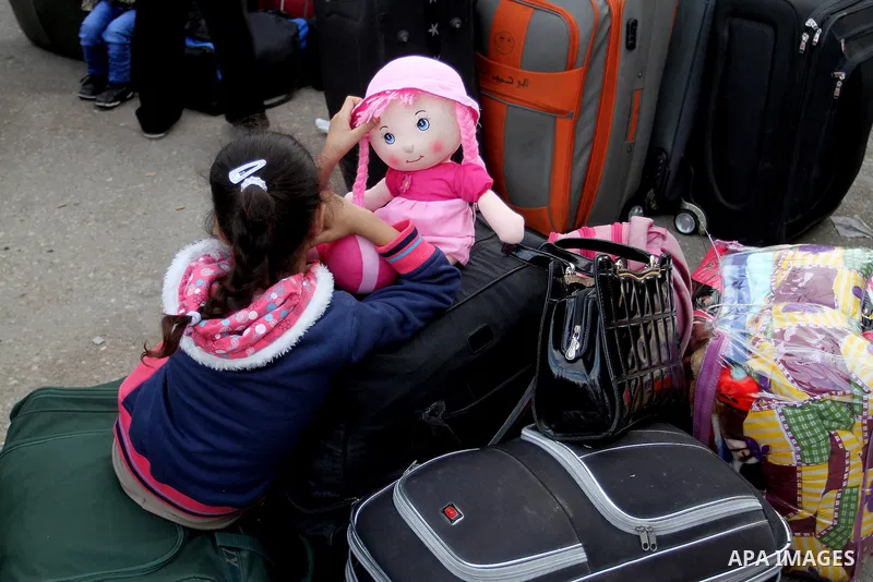 Palestinians wait for travel permits to cross into Egypt through the Rafah border crossing after it was opened by Egyptian authorities for humanitarian cases, in Rafah in the southern Gaza Strip October 19, 2016. Photo b...