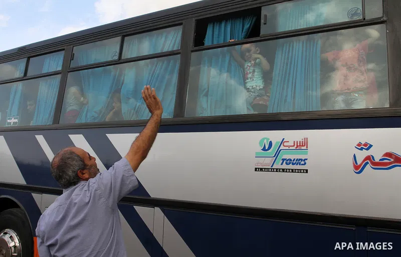 Palestinians wait for travel permits to cross into Egypt through the Rafah border crossing after it was opened by Egyptian authorities for humanitarian cases, in Rafah in the southern Gaza Strip October 19, 2016. Photo b...