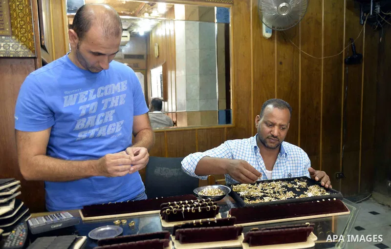 Egyptian vendors display jewellery at his jewellery store, in cairo, Egypy, on October 19, 2016. Decline in demand for gold in the Egyptian markets due to the high price. Photo by Amr Sayed