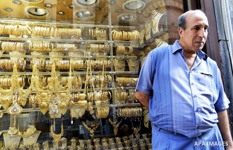 An Egyptian vendor stands outside his jewellery store, in cairo, Egypy, on October 19, 2016. Decline in demand for gold in the Egyptian markets due to the high price. Photo by Amr Sayed
