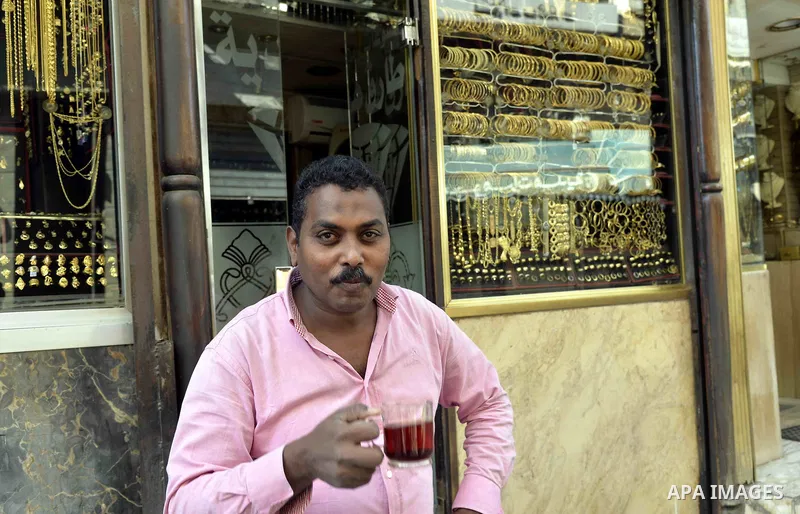 An Egyptian vendor sits outside his jewellery store, in cairo, Egypy, on October 19, 2016. Decline in demand for gold in the Egyptian markets due to the high price. Photo by Amr Sayed