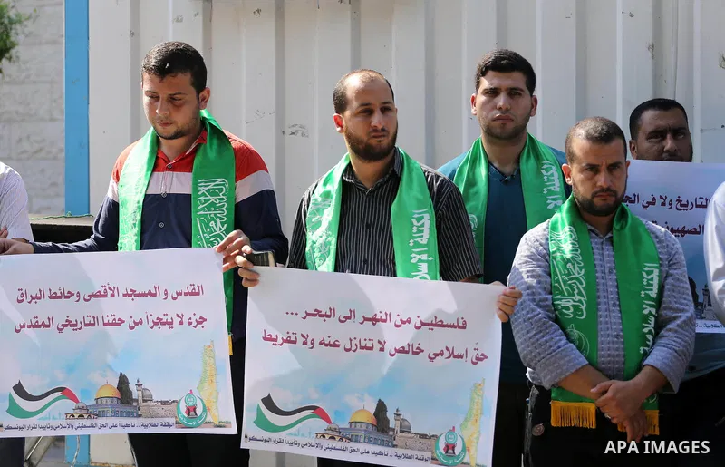 Palestinian Hamas supporters take part in a rally in support of the decision of UNESCO on the Al-Aqsa Mosque in front of the headquarter United Nation "UNSCO", in Gaza city, on October 20, 2016. Palestinian leaders have...