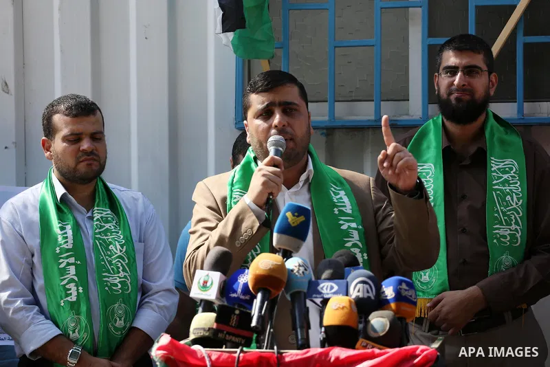 Palestinian Hamas supporters take part in a rally in support of the decision of UNESCO on the Al-Aqsa Mosque in front of the headquarter United Nation "UNSCO", in Gaza city, on October 20, 2016. Palestinian leaders have...