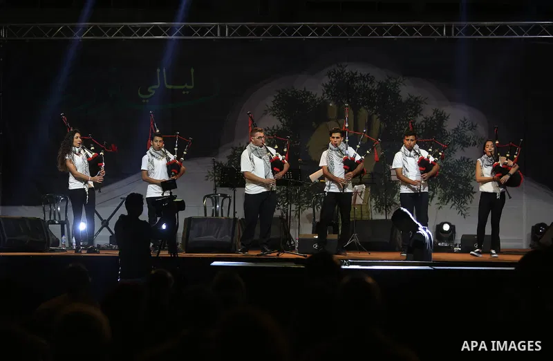 Palestinian youths perform during the Birzeit Nights Festival at Birzeit University in the West Bank city of Ramallah on Oct. 20, 2016. Photo by Shadi Hatem
