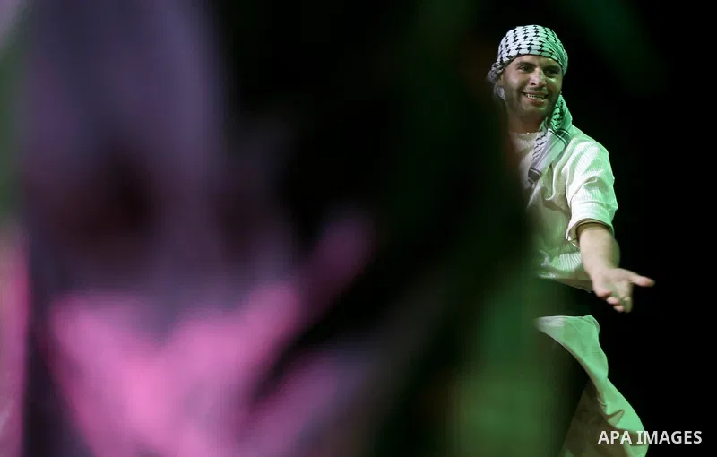 Members of Palestinian dance Dabka band perform during the Birzeit Nights Festival at Birzeit University in the West Bank city of Ramallah on Oct. 20, 2016. Photo by Shadi Hatem