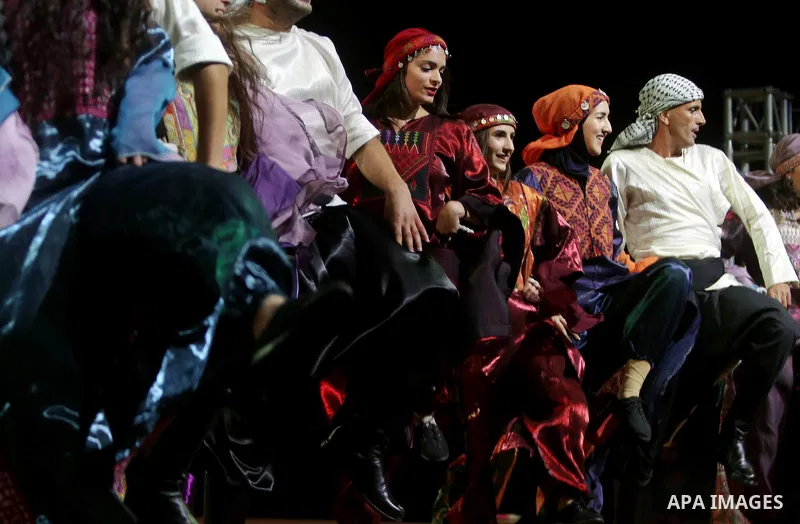 Members of Palestinian dance Dabka band perform during the Birzeit Nights Festival at Birzeit University in the West Bank city of Ramallah on Oct. 20, 2016. Photo by Shadi Hatem