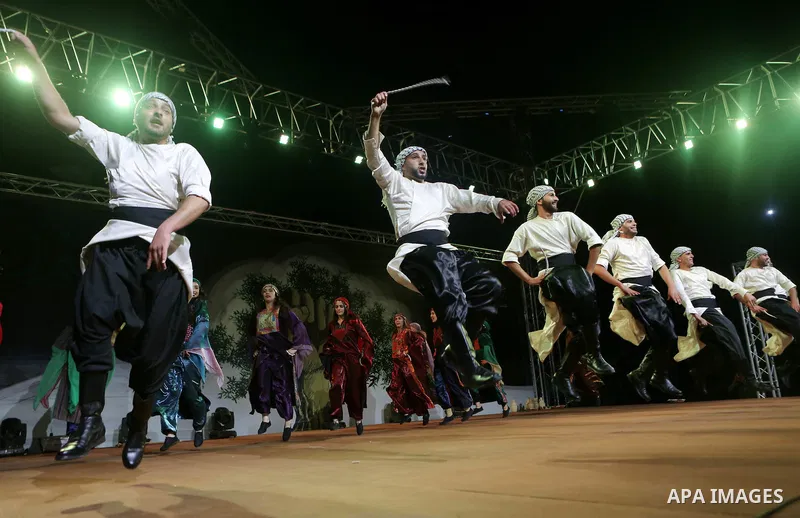 Members of Palestinian dance Dabka band perform during the Birzeit Nights Festival at Birzeit University in the West Bank city of Ramallah on Oct. 20, 2016. Photo by Shadi Hatem
