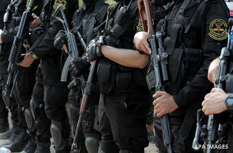 Palestinian Islamic Jihad militants stand guard during a rally marking the 29th anniversary of the movement foundation in Gaza City October 21, 2016. Photo by Abed Rahim Khatib