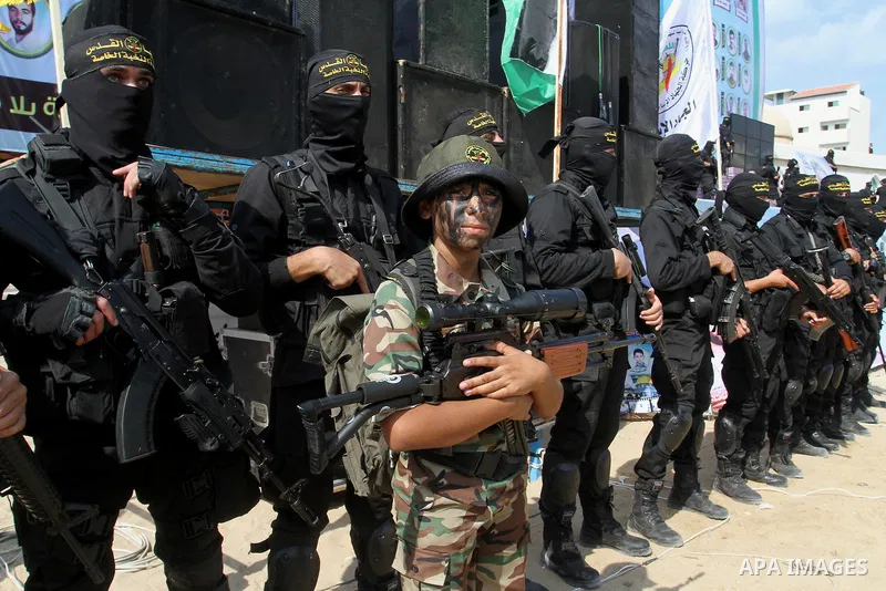 Palestinian Islamic Jihad militants stand guard during a rally marking the 29th anniversary of the movement foundation in Gaza City October 21, 2016. Photo by Abed Rahim Khatib