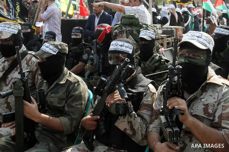Palestinian Islamic Jihad militants stand guard during a rally marking the 29th anniversary of the movement foundation in Gaza City October 21, 2016. Photo by Abed Rahim Khatib