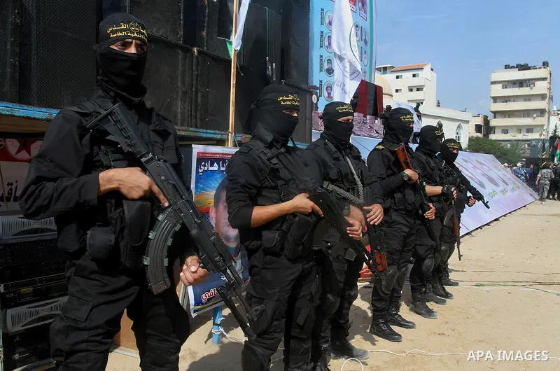 Palestinian Islamic Jihad militants stand guard during a rally marking the 29th anniversary of the movement foundation in Gaza City October 21, 2016. Photo by Abed Rahim Khatib