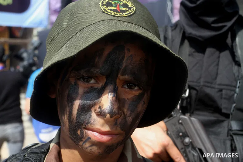 Palestinian Islamic Jihad militants stand guard during a rally marking the 29th anniversary of the movement foundation in Gaza City October 21, 2016. Photo by Abed Rahim Khatib