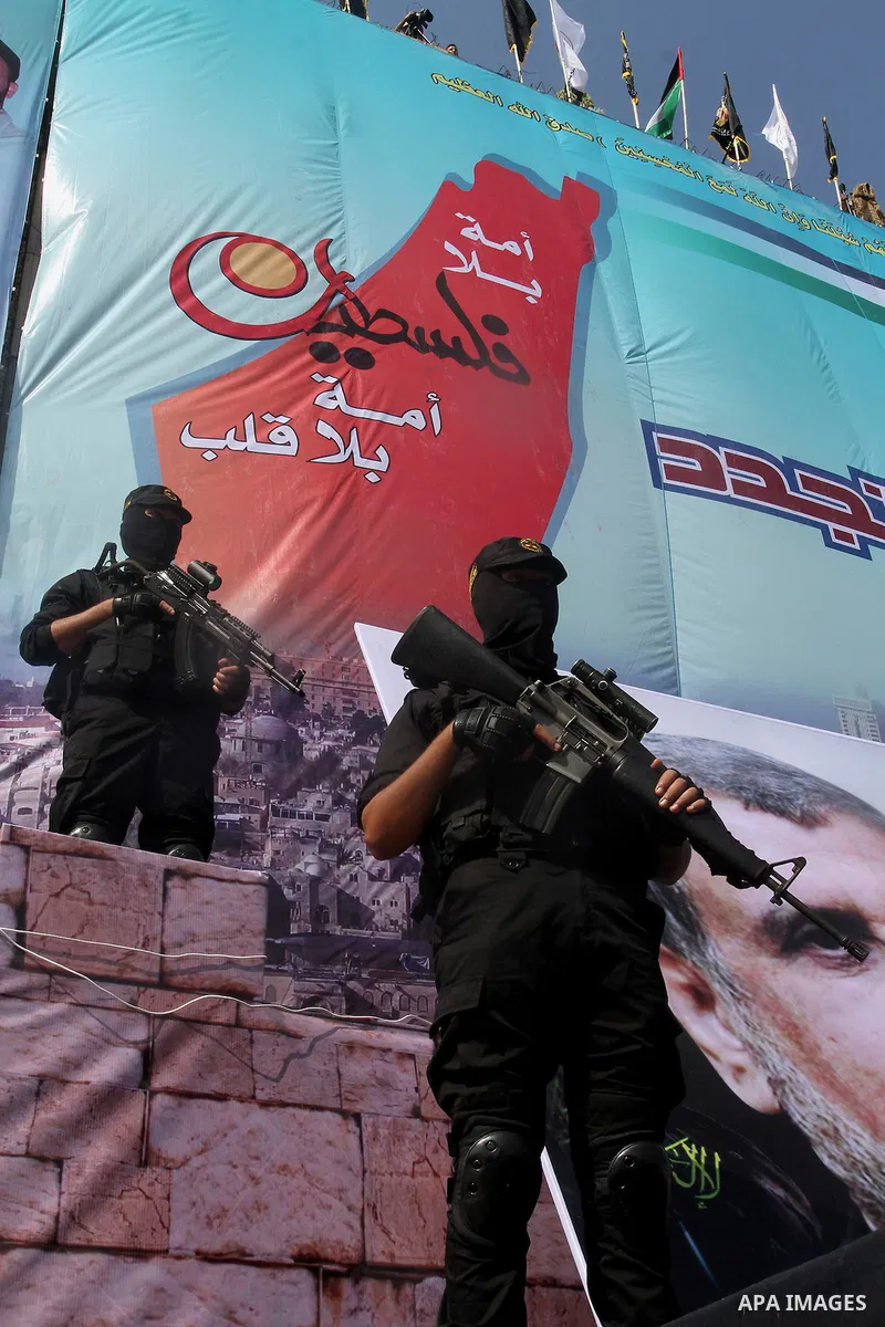 Palestinian Islamic Jihad militants stand guard during a rally marking the 29th anniversary of the movement foundation in Gaza City October 21, 2016. Photo by Abed Rahim Khatib