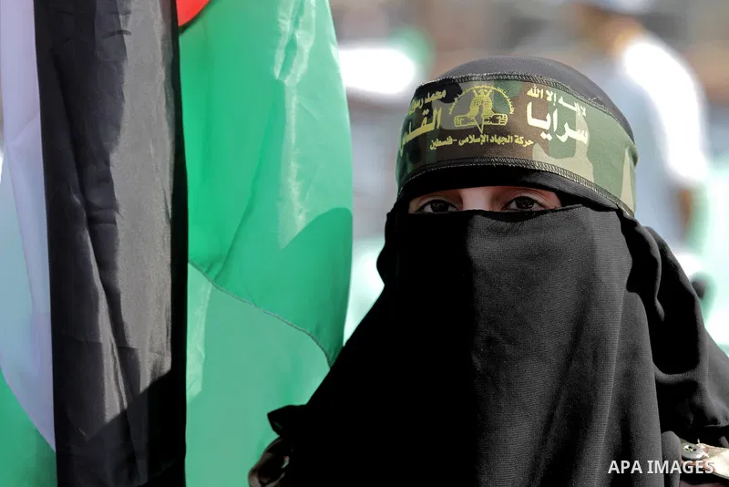 A Palestinian woman attends a rally marking the 29th anniversary of the foundation of the Islamic Jihad movement in Gaza City October 21, 2016. Photo by Abed Rahim Khatib