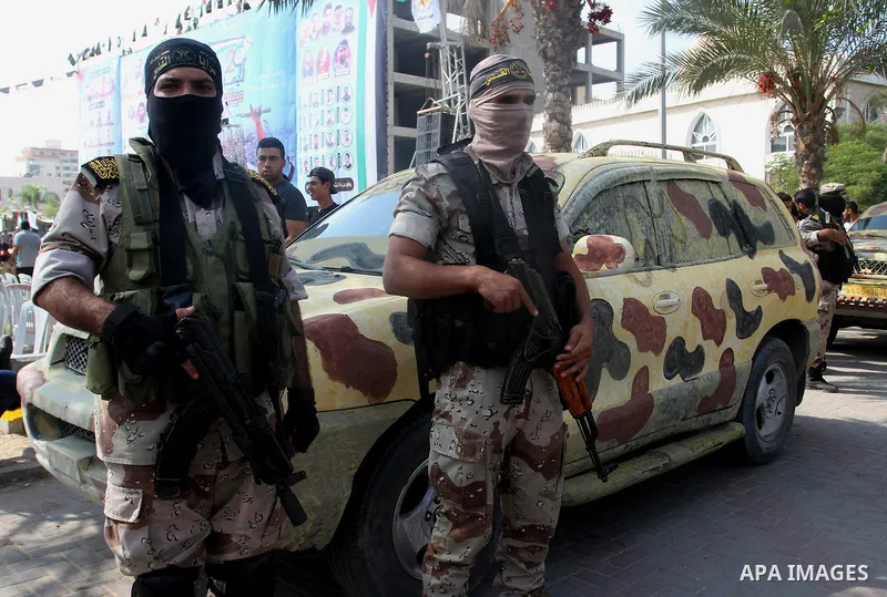 Palestinian Islamic Jihad militants stand guard during a rally marking the 29th anniversary of the movement foundation in Gaza City October 21, 2016. Photo by Abed Rahim Khatib