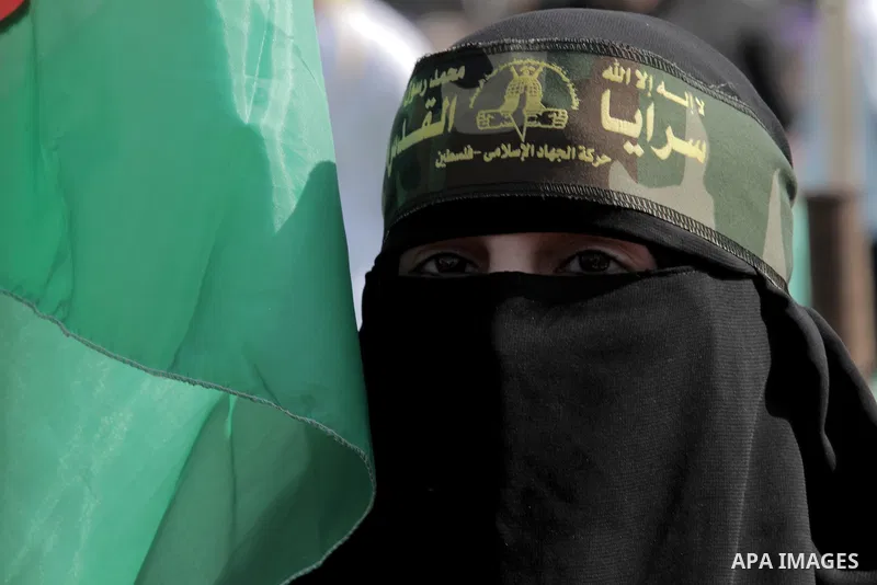 A Palestinian woman attends a rally marking the 29th anniversary of the foundation of the Islamic Jihad movement in Gaza City October 21, 2016. Photo by Abed Rahim Khatib