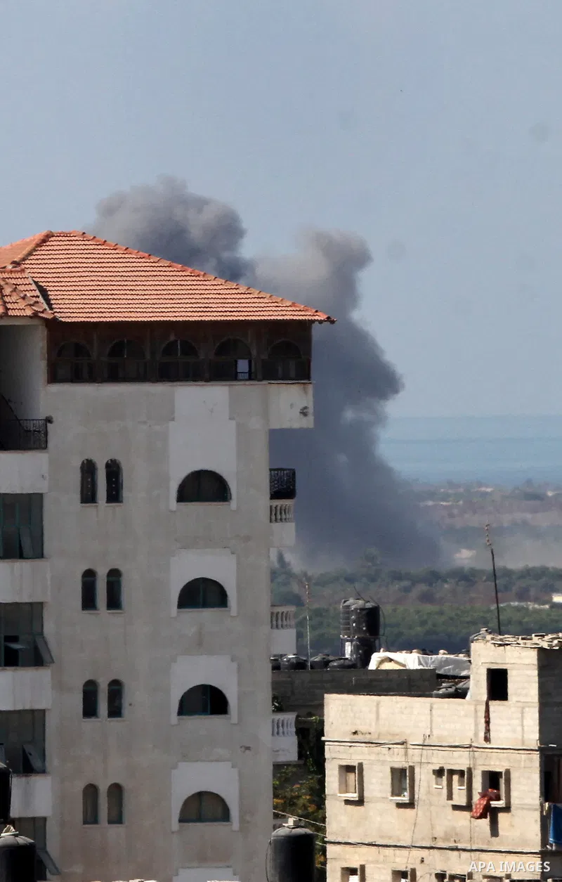 Smoke rises in Egypt's North Sinai as seen from the border of southern Gaza Strip with Egypt on Oct. 23, 2016. The Egyptian Air Force Sunday pounded jihadist groups in the Sinai Peninsula, reportedly killing 70 fighters...