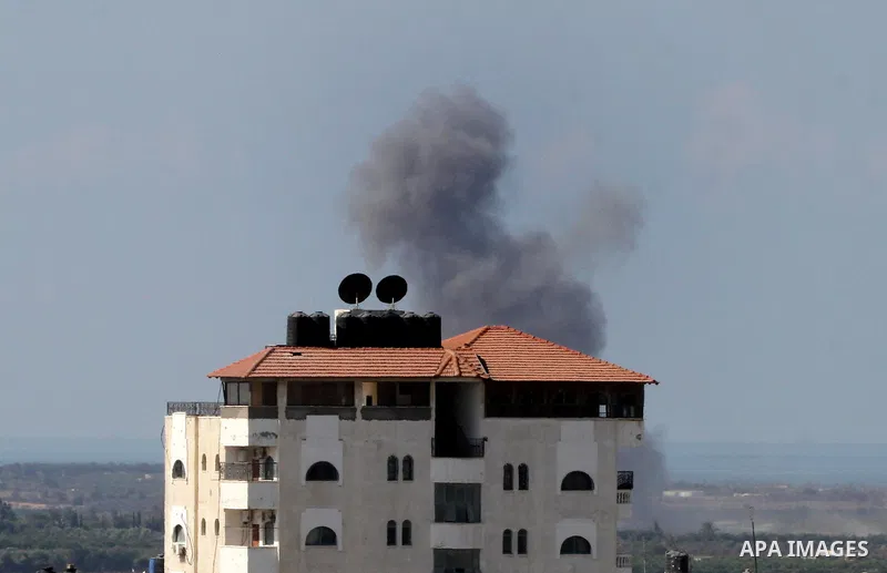 Smoke rises in Egypt's North Sinai as seen from the border of southern Gaza Strip with Egypt on Oct. 23, 2016. The Egyptian Air Force Sunday pounded jihadist groups in the Sinai Peninsula, reportedly killing 70 fighters...