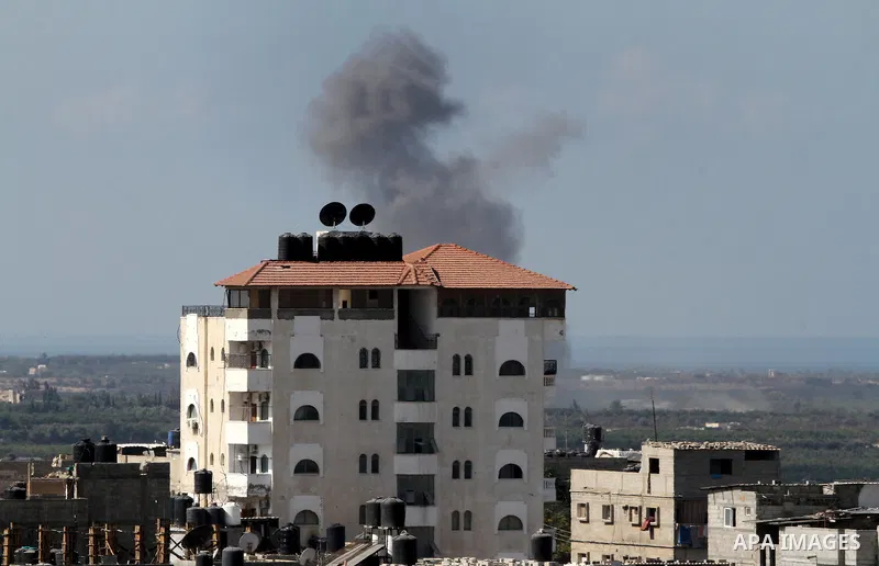 Smoke rises in Egypt's North Sinai as seen from the border of southern Gaza Strip with Egypt on Oct. 23, 2016. The Egyptian Air Force Sunday pounded jihadist groups in the Sinai Peninsula, reportedly killing 70 fighters...
