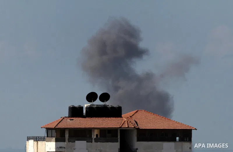 Smoke rises in Egypt's North Sinai as seen from the border of southern Gaza Strip with Egypt on Oct. 23, 2016. The Egyptian Air Force Sunday pounded jihadist groups in the Sinai Peninsula, reportedly killing 70 fighters...