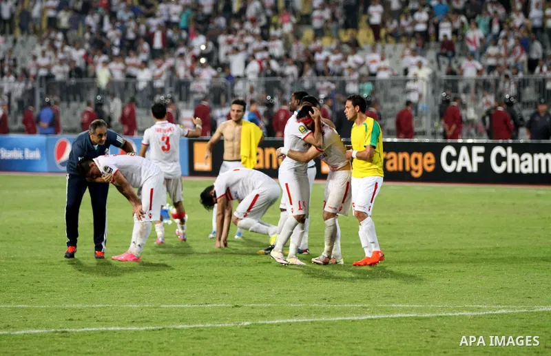Zamalek's players react after losing the CAF Champions League football competition following the second round of the final match against South Africa's Mamelodi Sundowns on October 23, 2016 at the Borg el-Arab Stadium ne...