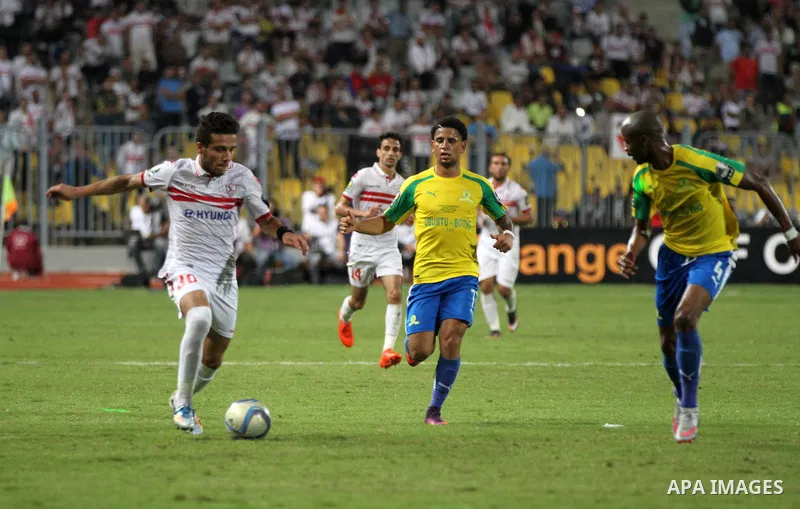 South Africa's Mamelodi Sundowns players and Egypt's Zamalek club compete during the CAF Champions League final football match between Zamalek and Mamelodi Sundowns on October 23, 2016 at the Borg el-Arab Stadium near Al...