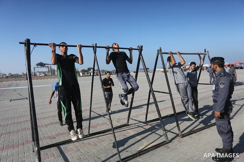 Palestinian applicants undergo a physical examination at a Hamas-run police recruitment centre in Gaza City October 24, 2016. Photo by Mohammed Asad