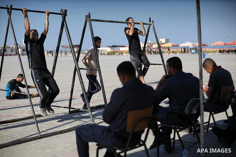 Palestinian applicants undergo a physical examination at a Hamas-run police recruitment centre in Gaza City October 24, 2016. Photo by Mohammed Asad