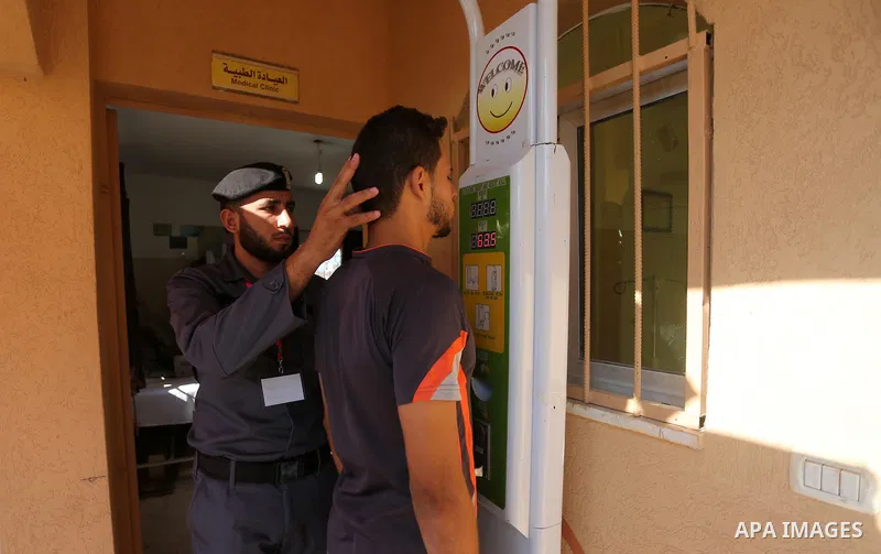 Palestinian applicants undergo a physical examination at a Hamas-run police recruitment centre in Gaza City October 24, 2016. Photo by Mohammed Asad